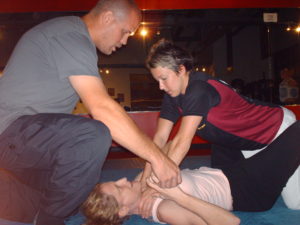 Are You Prepared instructor Jamie Nowak teaching women's self defense at Trinity Fitness in Atlanta Georgia